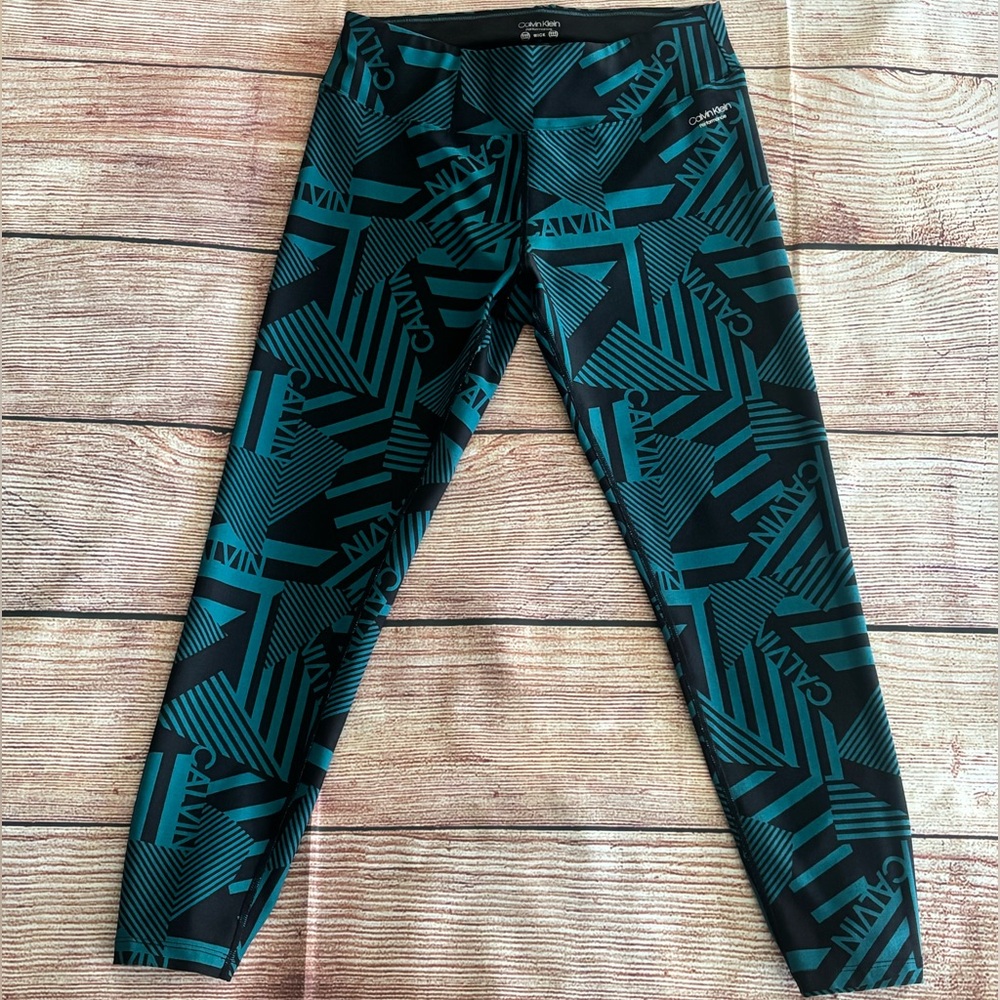 Calvin Klein Performance • Black and Teal Geometric Patterned Leggings - Size M